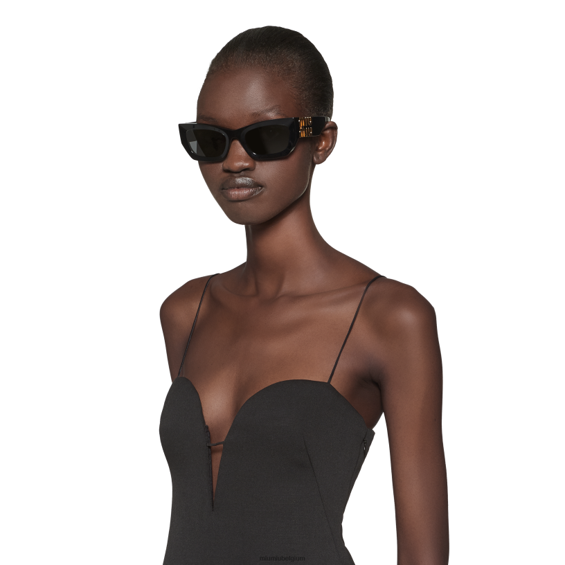 Miu Miu zwart witkorte jurk van grain de poudre N8F6L402 klaar om te dragen