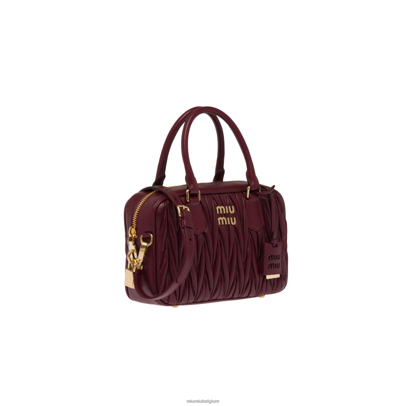 Miu Miu amarant rood/maïs geeltas van gematelasseerd nappaleer met handvat aan de bovenkant N8F6L148 verzameling