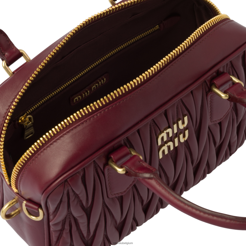 Miu Miu amarant rood/maïs geeltas van gematelasseerd nappaleer met handvat aan de bovenkant N8F6L148 verzameling